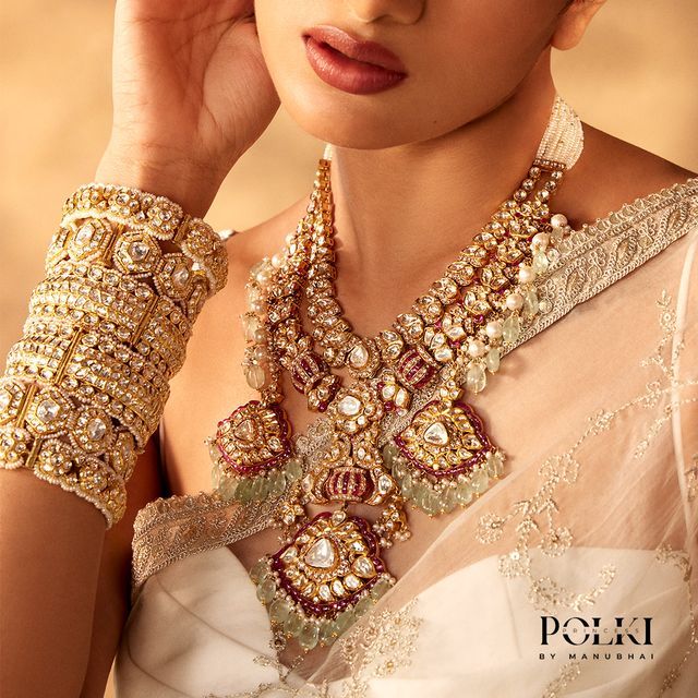 beautiful Polki necklace and kangan with sea green stones is something perfect to compliment